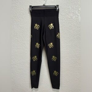 NWT Ultracor Legging- Size S & M- Color: black and gold